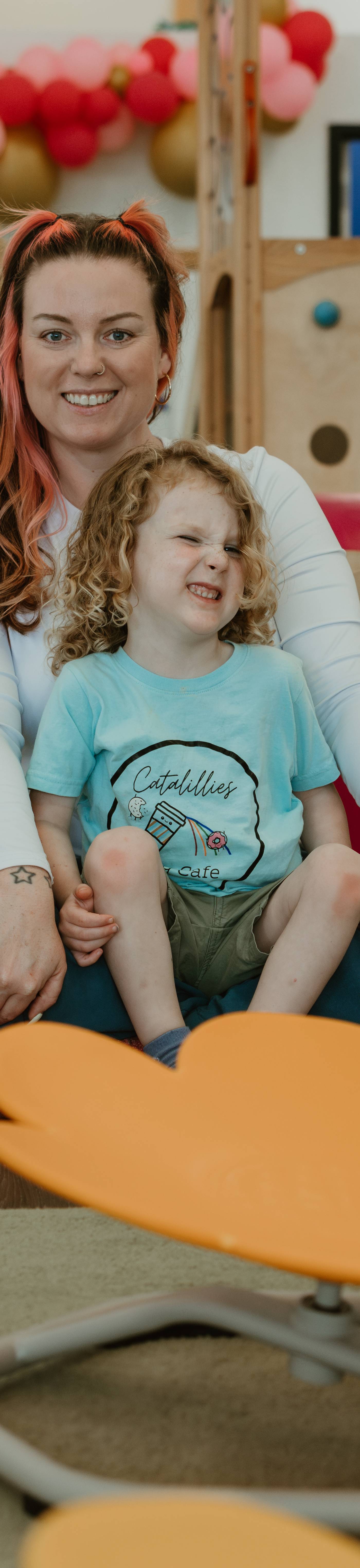 A mom and her toddler on the play floor at Catalillies Play Café in Williamsburg